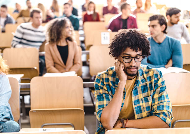 istock African American college student studying on a class at lecture hall. 1069244958