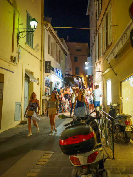 Saint Tropez, France - August 9 2017: Tourists, shopping in the streets of Saint-Tropez during the evening.