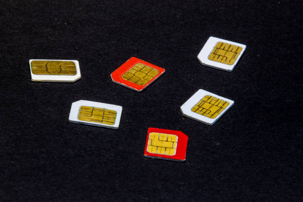 istock Many cellphone sim cards in different formats for black Background 1069246002