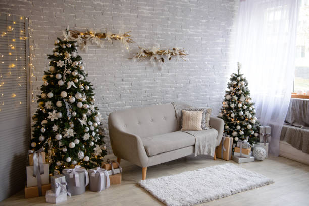 istock Christmas interior with gift boxes and Christmas fires 1069256794