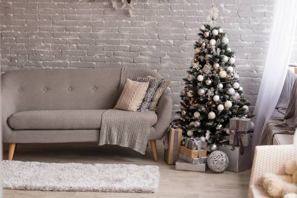 istock Christmas interior with gift boxes and Christmas fires 1069256808