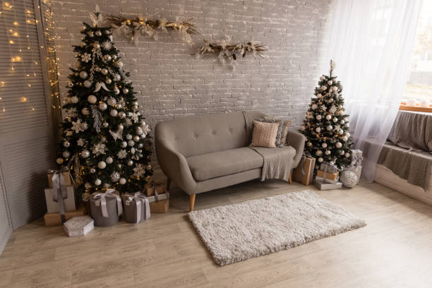 istock Christmas interior with gift boxes and Christmas fires 1069256920