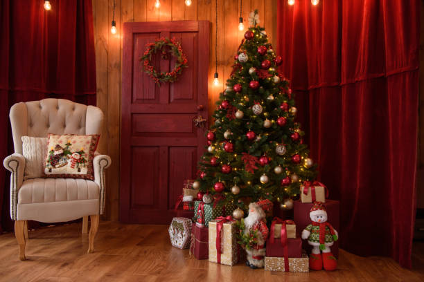 istock Christmas interior with gift boxes and Christmas fires 1069257054