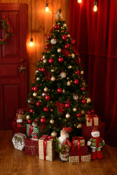 istock Christmas interior with gift boxes and Christmas fires 1069257210