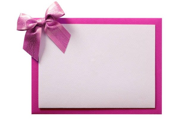 istock Christmas card pink ribbon bow envelope frame isolated 1069257656