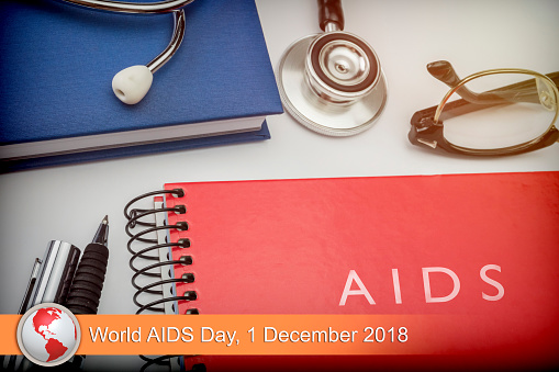 Digital composite of news flash with medical imagery, World AIDS Day 2018