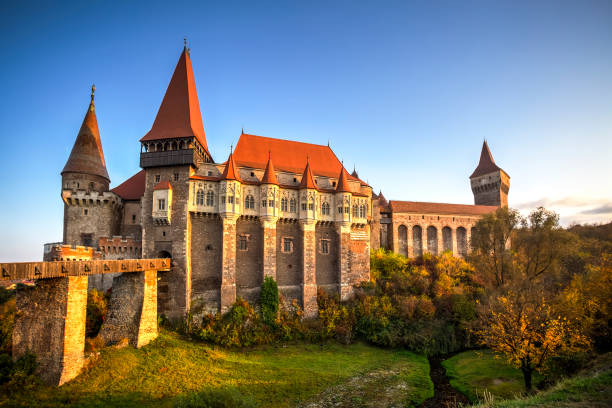 Hunyad Castle, Romania Hunyad or Corvin castle seen at the golden hour, in Hunedoara, Transylvania, Romania. Photo taken on 20th of October 2018. hunyad castle stock pictures, royalty-free photos & images