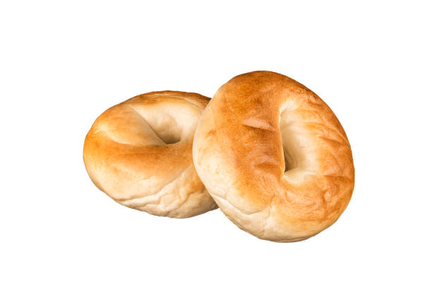 istock Close up on a set of plain bagel, isolated. 1069267628