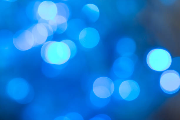 istock Amazing glowing blurred blue Christmas lights 1069268864