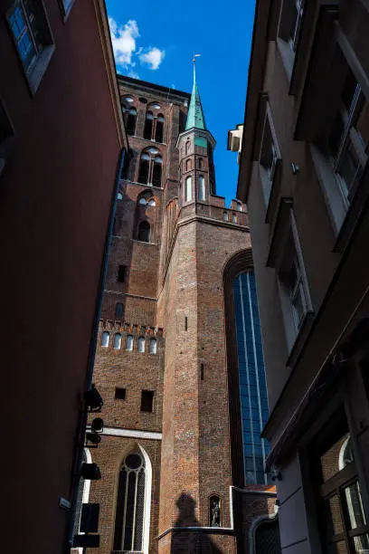 View of Kaletnicza Street from famous Dluga Street ,leading to St.Mary's Church , in the picturesque Main Town of Gdansk, Poland