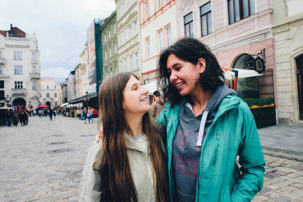 istock Beautiful women exploring old Europe city 1069275976