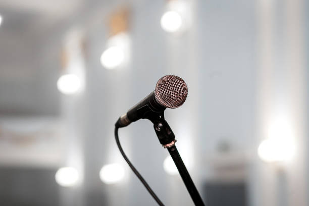 istock A microphone on stage in a concert hall or american bar (restaurant) during a show. 1069283170