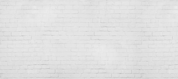 istock Vintage old white wash brick wall texture. Panoramic background for your text or image. 1069283760