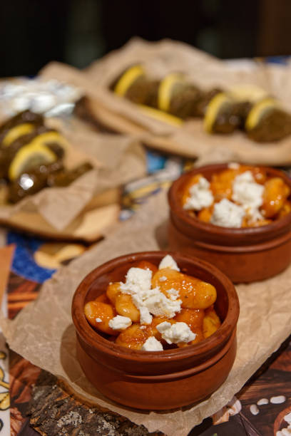istock Cooked beans with feta cheese and dolma rolls 1069284972