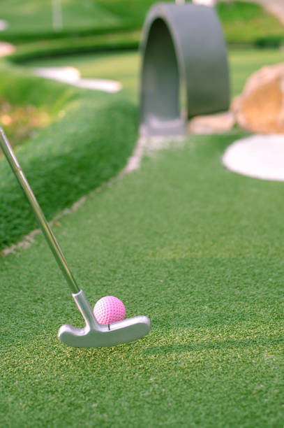 istock Golf ball and Golf Club on Artificial Grass. 1069287296