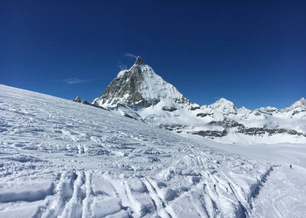 istock Majestic Matterhorn mountain in front of a blue sky 1069287896