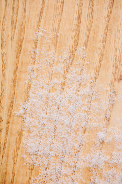 istock Wooden ground slightly covered with snow 1069296636