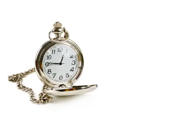 Pocket watch with chain isolated on white background. Free space for text.