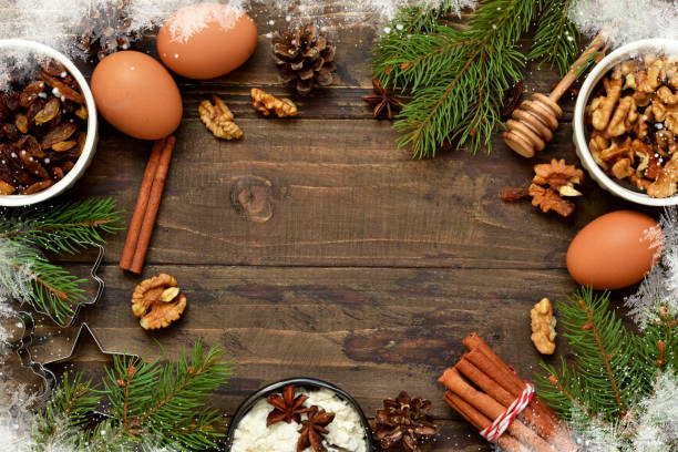 istock Christmas card with decorations on a wooden background. Christmas baking, cooking process. 1069300022