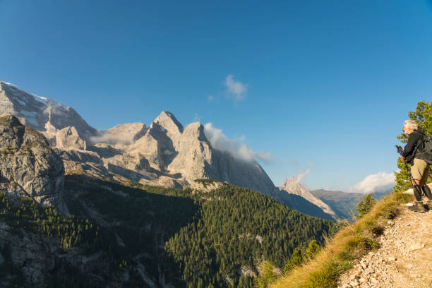 istock Senior men in front of Mt. Marmolada 1069301874