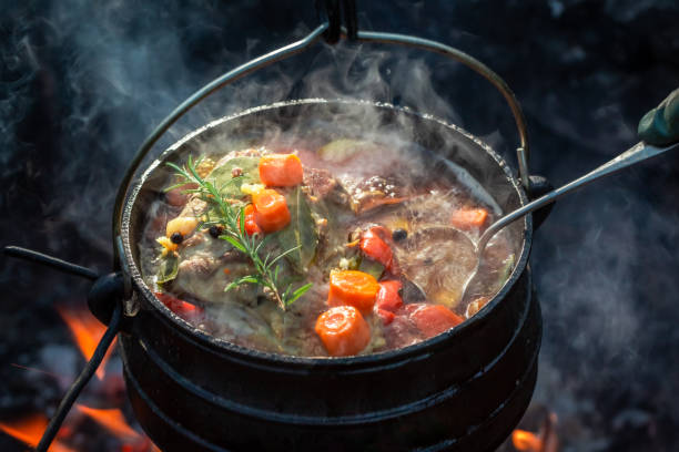 istock Hot and yummy hunter's stew on bonfire 1069305182