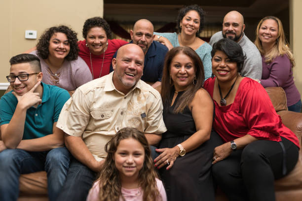 Family and friends celebrating with music Multi-generation family and neighbors gather. puerto rican ethnicity stock pictures, royalty-free photos & images