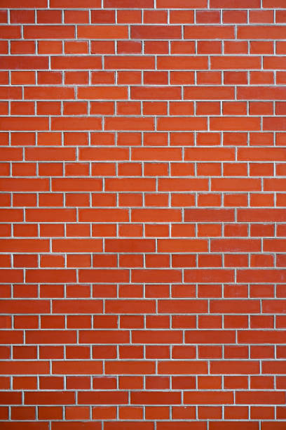 istock New Red Brick wall for background or texture. 1069312550