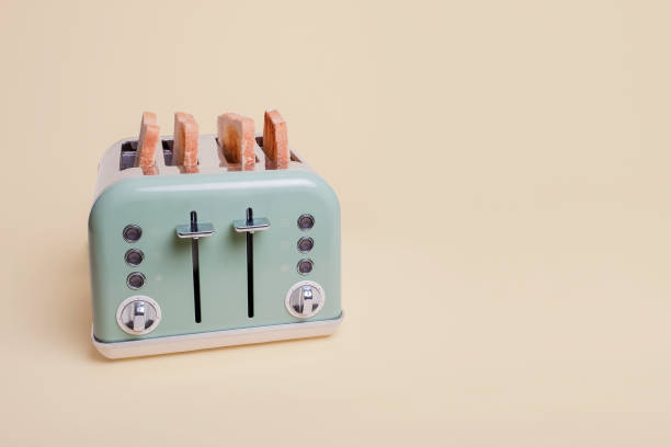 istock Retro green toaster with toast 1069312710
