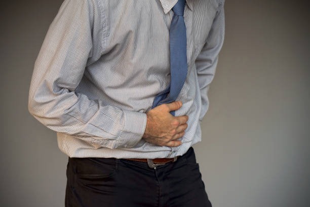 istock Businessman suffering from abdominal pain 1069313330