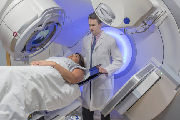 Woman Receiving Radiation Therapy Treatments for Breast Cancer stock photo