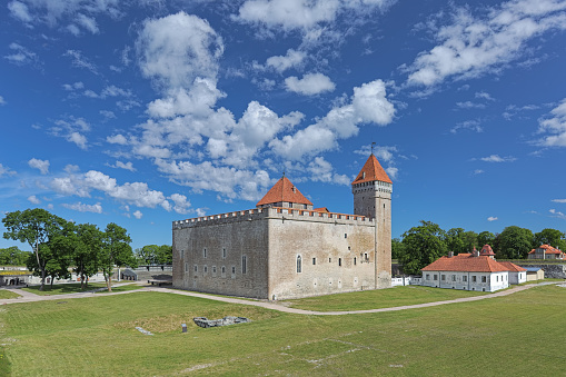 Kuressaare, Estonia - June 22, 2017: The convent building of the Kuressaare Episcopal Castle on Saaremaa island. The first written message about the Kuressaare Castle dates back to 1381. The castle is unique in being the only intact medieval fortress in the Baltic countries.