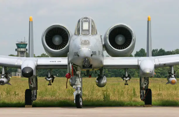 An A-10 Thunderbolt II anti-tank bomber on the platform of an air force base