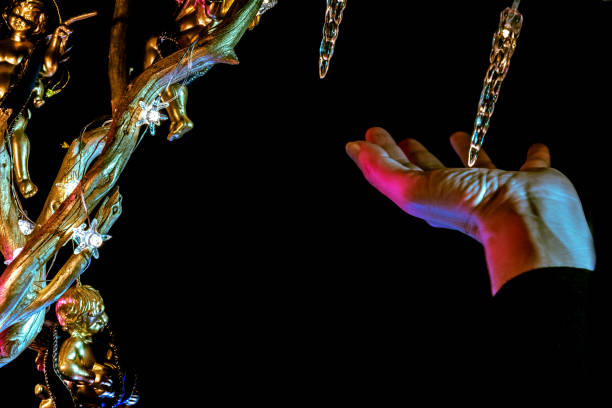 istock Close Up Woman Hand Arranging Christmas Decoration 1069328556