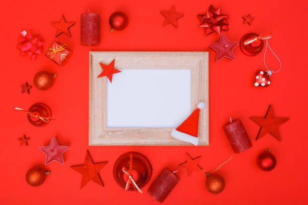 istock Directly Above Shot Of Christmas Decorations Over Red Background 1069345482