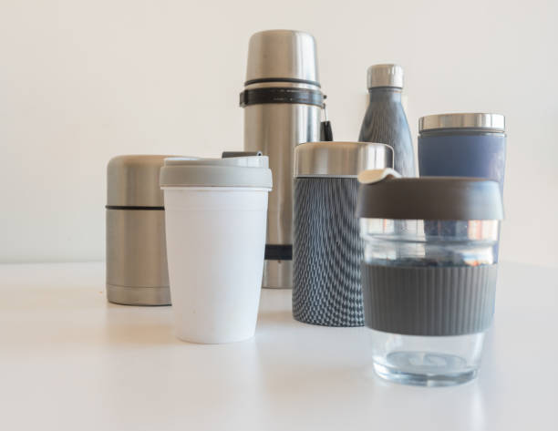 istock Close-Up Of Containers On Table Against White Background 1069358466