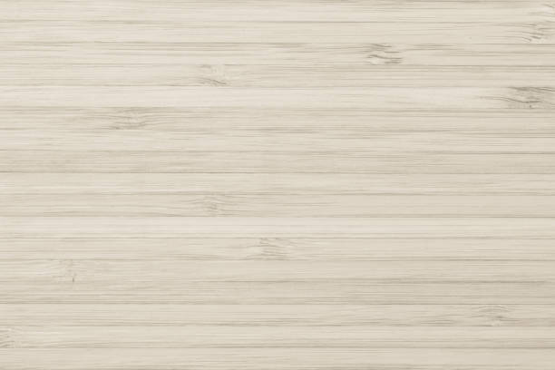 istock Bamboo wood texture background in beige cream color 1069358740