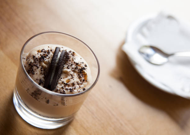 istock Cookie cup cakes on wooden table and small plate with spoon on it. 1069371660