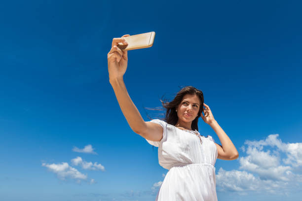 istock Happy woman take selfie 1069373278