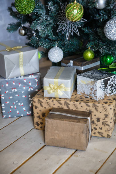 istock Gifts under the Christmas tree with decorations in the morning 1069378248