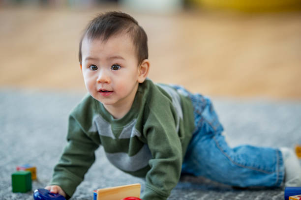 istock Adorable baby boy in preschool 1069393444