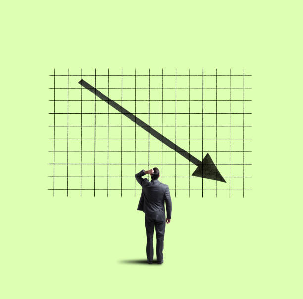 istock Businessman Looking Up At Declining Trend 1069395434
