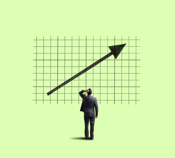istock Businessman Looking Up At Improving Trend 1069395438