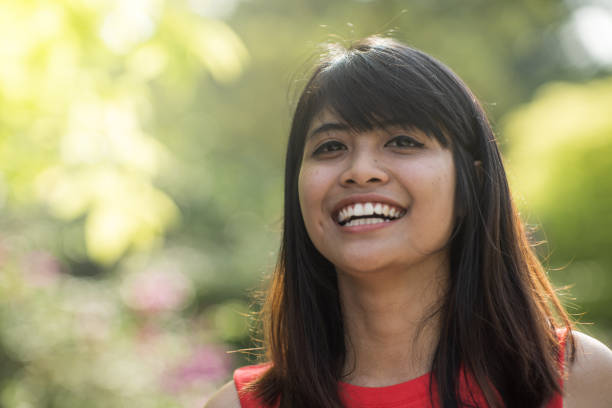 istock young asian teen exercising in a park 1069408040