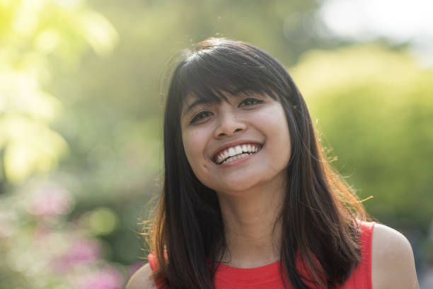 istock young asian teen exercising in a park 1069408044