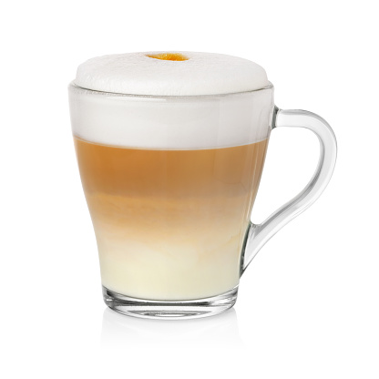 Transparent cup with cappuccino coffe and milk foam isolated on white background