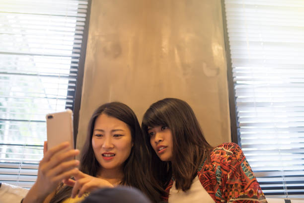 istock asian indoor having fun at christmas indoor 1069417456
