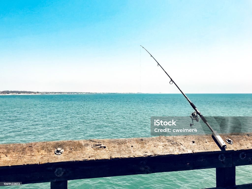 Fishing From The Dock Stock Photo - Download Image Now - Fishing