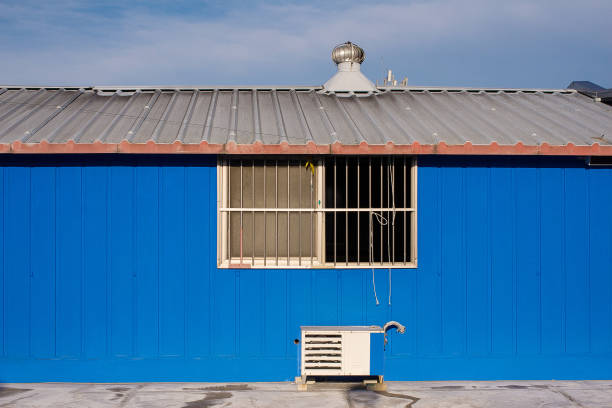istock a blue house made of containers And window 1069423298