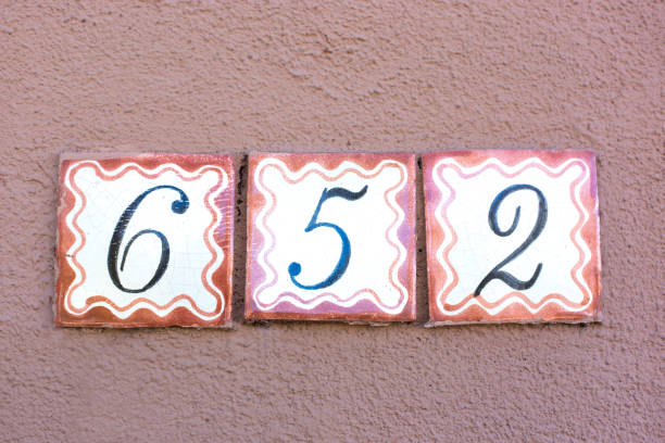 istock Ceramic Number 652 Street Address Tiles; Brown Wall 1069424914