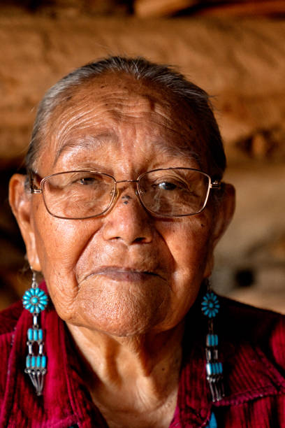 istock Beautiful Eighty Five Year Old Senior Native American Navajo Woman Posing Inside an Authentic Hogan 1069425600